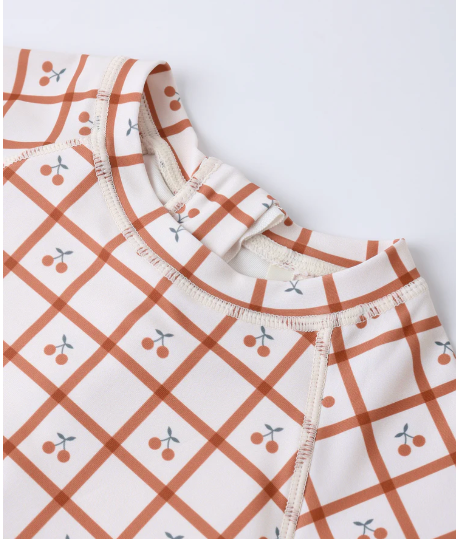 DELPHINE RASHGUARD ONE-PIECE CHERRY CHECK